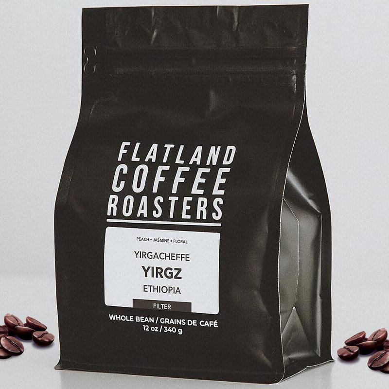 Svart bakgrund kaffe sidkil dragkedja väska